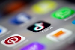 TikTok logo on a mobile phone