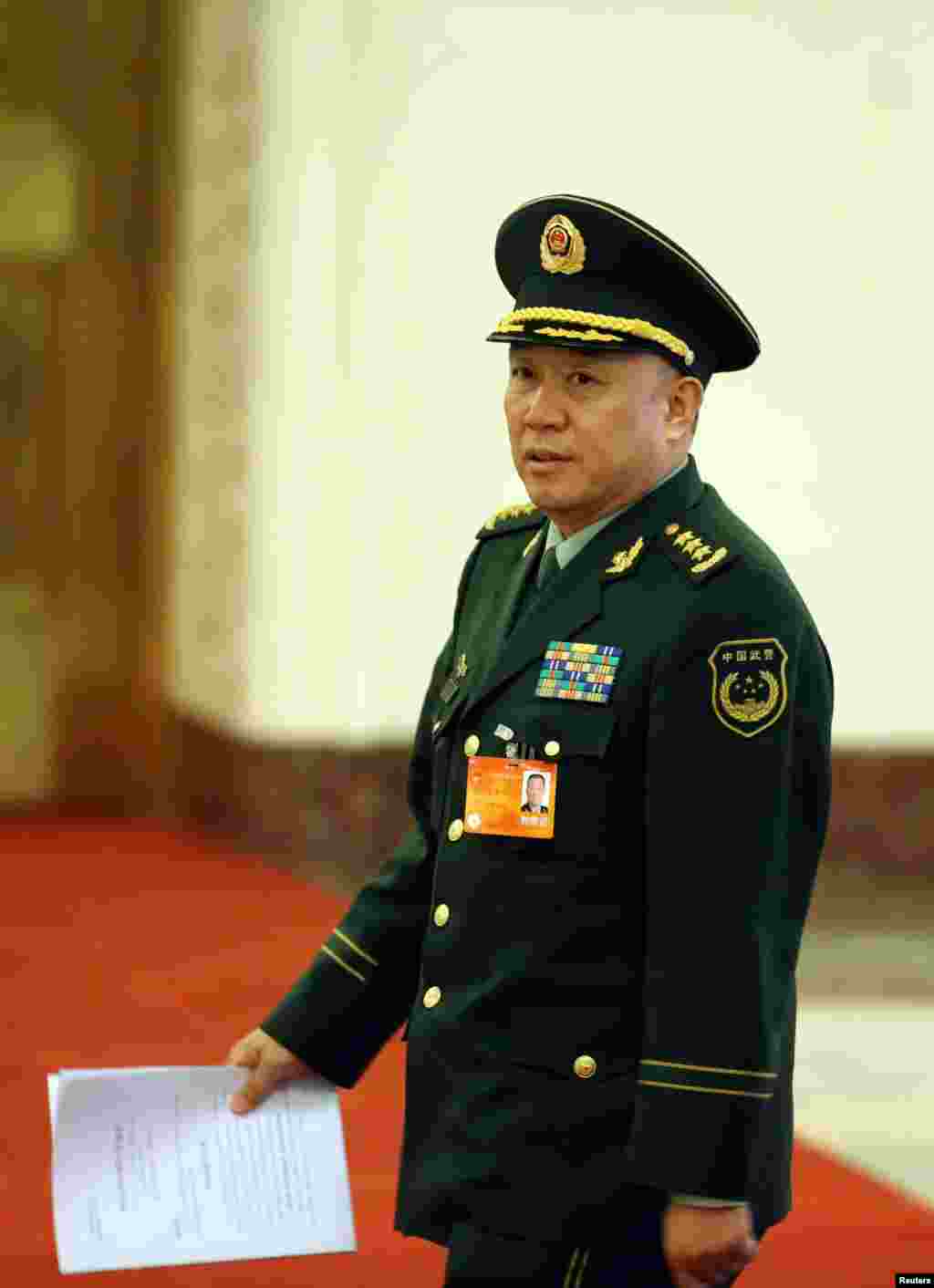 2014年3月10日,中国武警部队司令员王建平在北京开会。2016年11月29日,中国国防部新闻发言人杨宇军说,王建平因涉嫌受贿犯罪,被中国军事检察机关立案侦查。王建平被认为是已经落马的前中共中央政法委书记周永康的亲信。他担任武警部队司令员时,周永康是他的直接上司。王建平也是中共“十八大”后中国军警系统首位落马的现役上将。