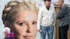 Supporters of jailed former Ukrainian Prime Minister Yulia Tymoshenko chat in a protest tent camp in central Kiev, Oct. 7, 2013. 