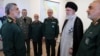 علی خامنه‌ای، رهبر ایران، حین دادن مدال افتخار به امیرعلی حاجی‌زاده، یک قوماندان نیروی های هوایی سپاه پاسداران
