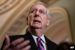 FILE - Senate Majority Leader Mitch McConnell, R-Ky., speaks to reporters on Capitol Hill in Washington, Feb. 26, 2019.
