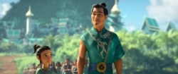 Raya kecil bersama sang ayah, Chief Benja, yang bercita-cita mempersatukan kembali negeri Kumandra. (Foto: Courtesy/Disney Media and Entertainment Distribution)