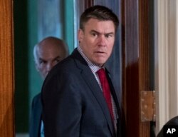 FILE - White House Communications Director Mike Dubke arrives in the East Room of the White House in Washington, April 20, 2017. Dubke has resigned as President Donald Trump considers a major staff overhaul amid intensifying inquiries into his campaign's