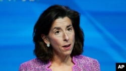 FILE - In this Jan. 8, 2021 file photo, President Joe Biden's nominee for Secretary of Commerce, Gina Raimondo speaks during an event in Wilmington, Del. The Senate has voted to confirm Raimondo as Biden's commerce secretary. 