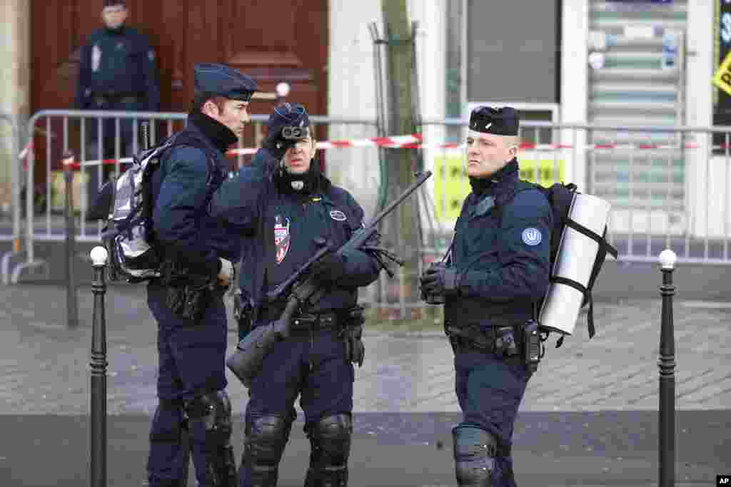Security officers patrol the Place de la Republique in Paris, Jan. 11, 2015.
