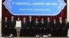 U.S. President Barack Obama (5th L) participates in a family photo with ASEAN leaders during the ASEAN Summit at the Peace Palace in Phnom Penh, November 19, 2012. 