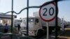 Trucks from a convoy that delivered humanitarian aid for Ukraine move back to Russia, Aug. 23, 2014. 