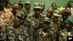 Renegade Malian soldiers appear on television at the ORTM television studio in Bamako in this March 22, 2012. THIS IMAGE HAS BEEN SUPPLIED BY A THIRD PARTY. IT IS DISTRIBUTED, EXACTLY AS RECEIVED BY REUTERS. 