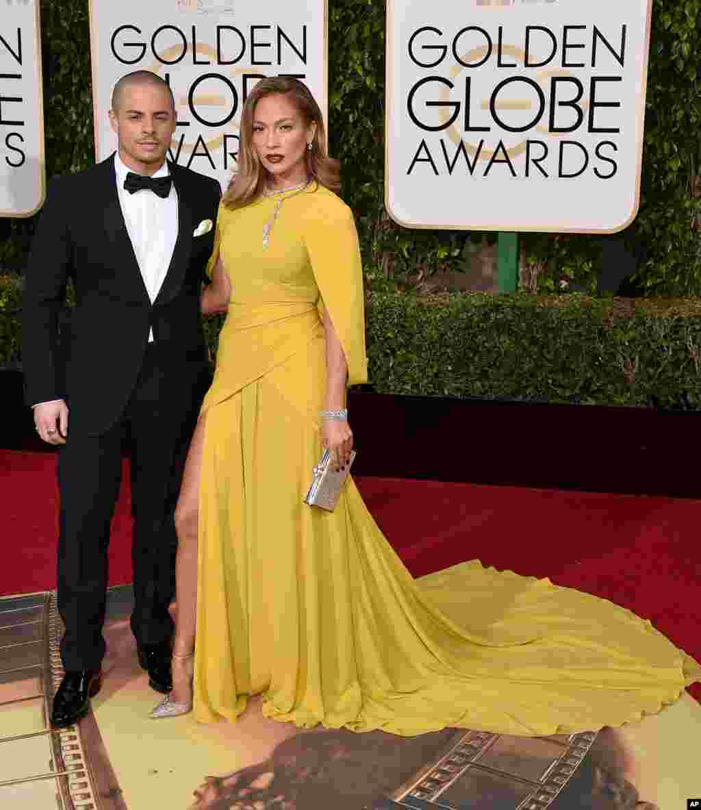 Casper Smart, left, and Jennifer Lopez arrive at the 73rd annual Golden Globe Awards on Jan. 10, 2016, at the Beverly Hilton Hotel in Beverly Hills, Calif.