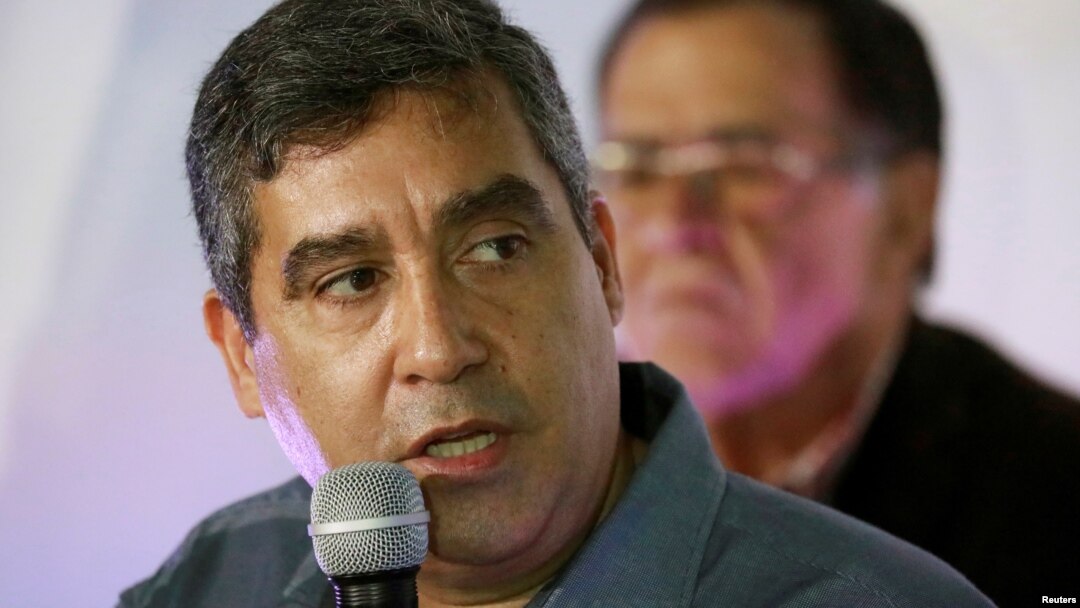 FILE PHOTO: Former Venezuela's Interior and Justice Minister and intelligence service head Miguel Rodriguez talks to the media during a news conference in Caracas, June 27, 2017.