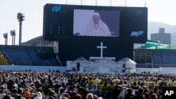 Pope Francis celebrates a Mass at Nagasaki Prefectural Baseball Stadium, Sunday, Nov. 24, 2019, in Nagasaki, Japan. 