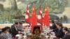 Chinese President Xi Jinping (2nd-R) meets Nepal Prime Minister Khadga Prasad Sharma Oli (2nd L) at the Great Hall of the People in Beijing, China March 21, 2016.