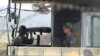 South Korean soldiers stand watch at a checkpoint in Paju, near the border with North Korea, in the wake of rocket and missile firings by Pyongyang into waters off the nation's east coast, Sept. 6, 2014.
