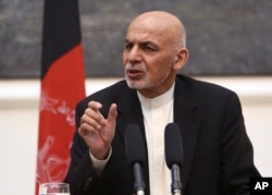 FILE - Afghan President Ashraf Ghani speaks during a joint press conference in Kabul, July 12, 2016.