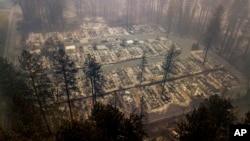 Residences leveled by the wildfire line a neighborhood in Paradise, Calif., on Nov. 15, 2018. 
