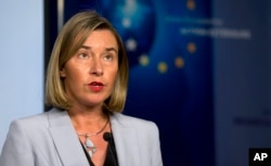 European Union foreign policy chief Federica Mogherini speaks during a media conference after a meeting of the EU3 and Iran at EEAS headquarters in Brussels, Jan. 11, 2018.