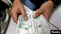 Rusia tampaknya akan mengalami kegagalan pembayaran utang pertama dalam beberapa dekade karena beberapa pemegang obligasi mengatakan mereka belum menerima pembayaran bunga yang jatuh tempo pada Senin (27/6). (Foto: Reuters)