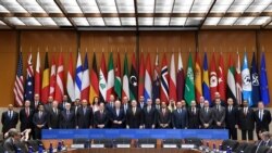 Secretary of Sate Mike Pompeo, center, and other foreign ministers and foreign officials pose for a photo at the State Department in Washington, Nov. 14, 2019, for the Global Coalition to Defeat ISIS Small Group Ministerial meeting.