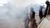 FILE - Libyan forces allied with the U.N.-backed government gather at the eastern frontline of fighting with Islamic State militants, in Sirte's neighborhood 650, Libya, Oct. 21, 2016.