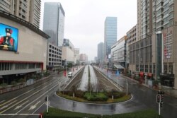 Street view after Wuhan government announced to ban non-essential vehicles in downtown area to contain coronavirus outbreak, on the second day of the Chinese Lunar New Year, in Wuhan, Hubei province, Jan. 26, 2020.