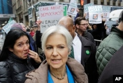 FILE - Jill Stein, the presidential Green Party candidate, arrives for a news conference in front of Trump Tower, Dec. 5, 2016, in New York.