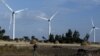 A man walks near the Adama wind farm project built by Chinese Exim bank on the outskirt of Adama Town, east of the capital Addis Ababa, Nov. 5, 2015.
