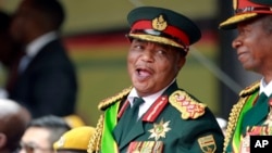 Army General Constantino Chiwenga smiles during the presidential inauguration ceremony in Harare, Zimbabwe, Nov. 24, 2017.
