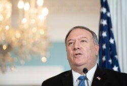 FILE - Secretary of State Mike Pompeo speaks to the media at the State Department, Nov. 24, 2020 in Washington.