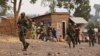 Congolese government army FARDC soldiers walk towards the frontline where they are fighting against M23 rebels outside the eastern Congolese city of Goma, July 14, 2013. Democratic Republic of Congo's army clashed with fighters from the M23 rebel group cl