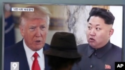 FILE - A man watches a TV screen showing U.S. President Donald Trump, left, and North Korean leader Kim Jong Un during a news program at the Seoul Train Station in Seoul, South Korea, Aug. 10, 2017. Many in China would like to see Trump tone down his rhetoric toward North Korea.