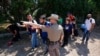 Hungry in Crowded Texas Camp, Migrants Return to Mexico for Food 