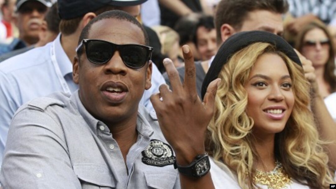 Rapper Jay-Z and his wife, singer Beyonce, attend the match between Novak Djokovic of Serbia and Rafael Nadal of Spain during the men's final of the U.S. Open tennis tournament in New York (file photo)