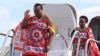 FILE - King of Swaziland Mswati III and one of his 13 wives disembark from a plane after arriving at Katunayake International airport in Colombo, Sri Lanka, Aug. 13, 2012. 