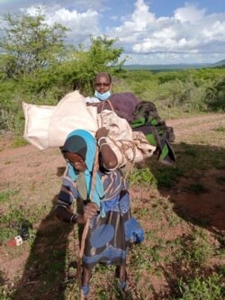 FILE - People have been displaced from Wachile, Southern Oromia region of Ethiopia, May 5, 2020. The country is trying to avoid a food crisis caused by a huge invasion of locusts.