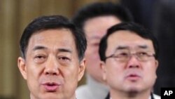 重慶市委書記薄熙來﹑前重慶副市長王立軍(右)(資料圖片)