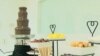 Chocolatier Hillary Bradley serves a variety of foods with the chocolate fountain, including pretzels, cookies, marshmallows and fruit.