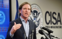 FILE - Then-U.S. Cybersecurity and Infrastructure Security Agency Director Christopher Krebs speaks to reporters at CISA’s Election Day Operation Center in Arlington, Va., March 3, 2020.