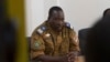 Lieutenant Colonel Isaac Zida meets with opposition leaders in Ouagadougou, capital of Burkina Faso, Nov. 2, 2014.