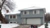 The home of Papa Faal in Brooklyn Center, Minn. Faal, 46, is one of two men in federal custody that prosecutors charged Monday with conspiring to help overthrow the government in the tiny West African nation of Gambia, Jan. 5, 2015. 