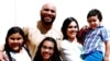 Junior Andres Francisco poses with wife Mirtha, holding their son, and two daughters in this undated photograph. They fear he may be deported from the United States to his native Dominican Republic because of a drug conviction. 