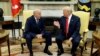 New White House Chief of Staff John Kelly talks with President Donald Trump after being privately sworn in during a ceremony in the Oval Office, July 31, 2017, in Washington. 