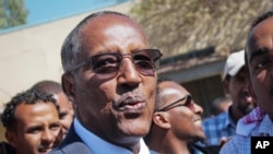 FILE - Ruling party candidate Muse Bihi Abdi - and election winner - speaks to the media after casting his vote in the presidential election in Hargeisa, in the semi-autonomous region of Somaliland, in Somalia, Nov. 13, 2017. 