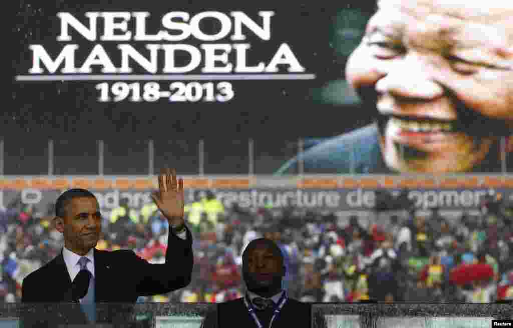 U.S. President Barack Obama addresses the crowd during a memorial service for Nelson Mandela at FNB Stadium in Johannesburg, Dec. 10, 2013.