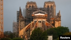 A view shows the restoration work at Notre Dame Cathedral, which was damaged in a devastating fire almost one year ago, in Paris, France, April 7, 2020. 