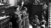 FILE - Antonio Tejero, Spanish Civil Guard, raises arm during an attempted coup in the Spanish Parliament, Madrid, Spain, Feb. 23, 1981.
