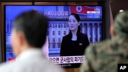 A man watches a TV screen showing a news program with a file image of Kim Yo Jong, the powerful sister of North Korea's leader Kim Jong Un, at the Seoul Railway Station in Seoul, South Korea, Thursday, June 4, 2020. North Korea threatened on…