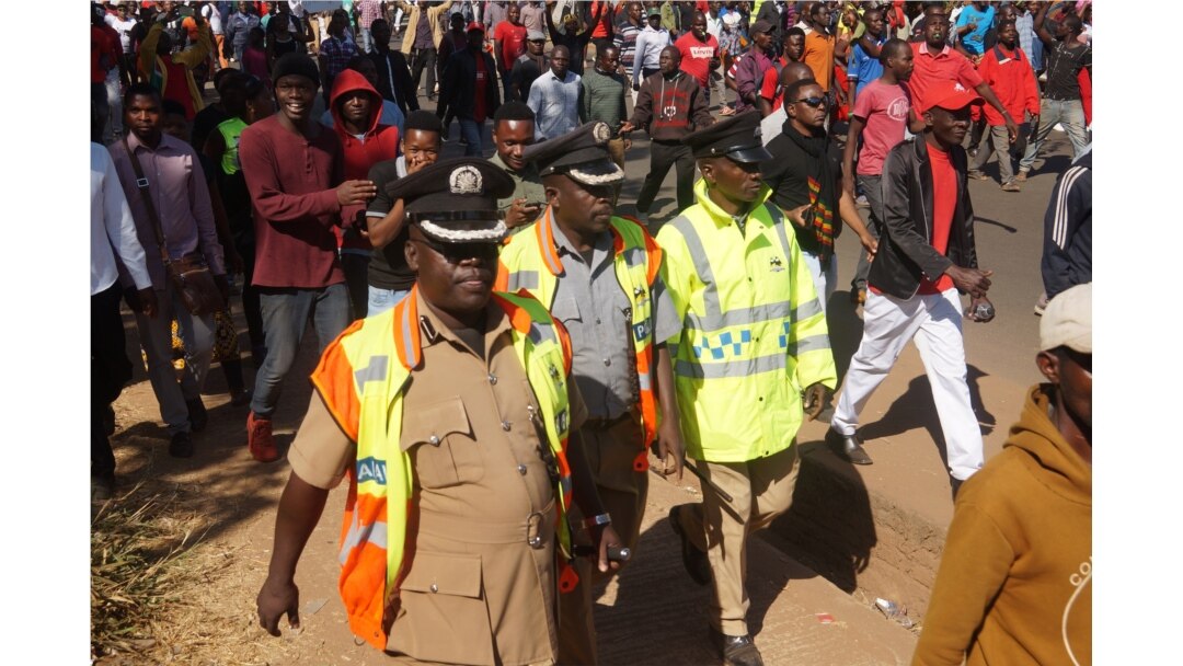 Police were barred from providing security to activists protesting the alleged sexual assault of 17 women, in Lilongwe, Malawi, Jan. 9, 2020. (Lameck Masina/VOA)