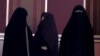 Iran's Judiciary Chief Threatens to Prosecute 'Without Mercy' Unveiled Women