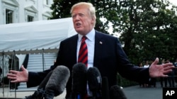 President Donald Trump speaks to reporters before leaving the White House in Washington, June 8, 2018, to attend the G7 Summit in Charlevoix, Quebec, Canada. 