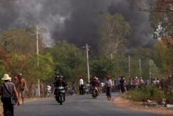 FILE - Demonstrators are seen before a clash with security forces in Taze, Sagaing Region, Myanmar, April 7, 2021, in this image obtained by Reuters.